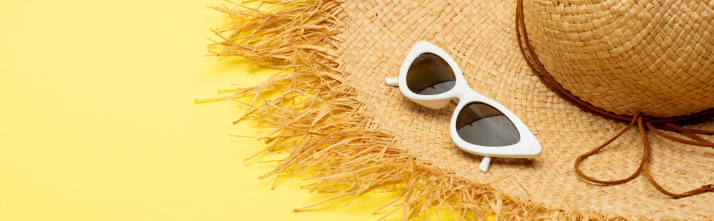 straw hat and white sunglasses